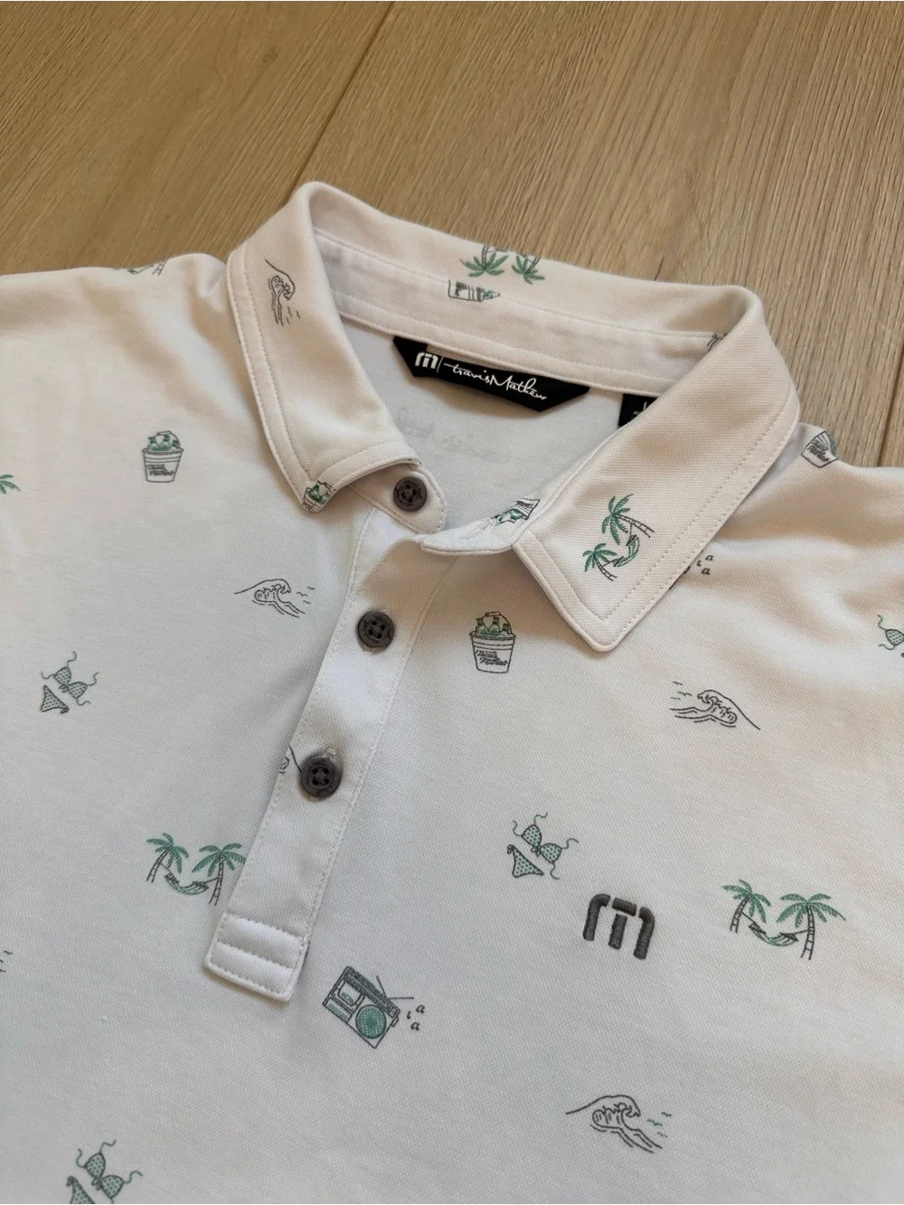 Travis Mathew White Polo with Palm & Beach Icons